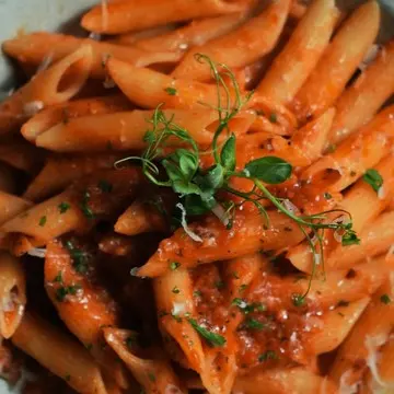 Penne arrabiata in spicy tomato sauce.