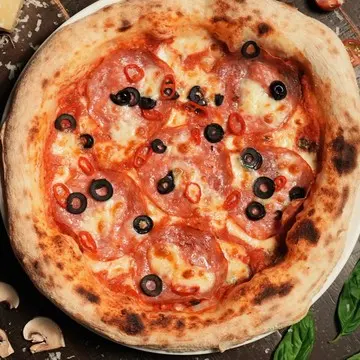 Diavola pizza with beef salami, red chilli and black olives.