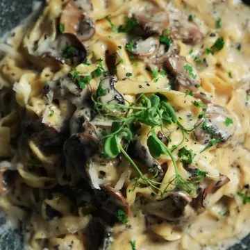 Linguine in a creamy wild mushroom and truffle sauce.
