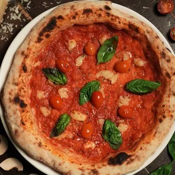 Marinara pizza with roasted garlic and oregano, no cheese.